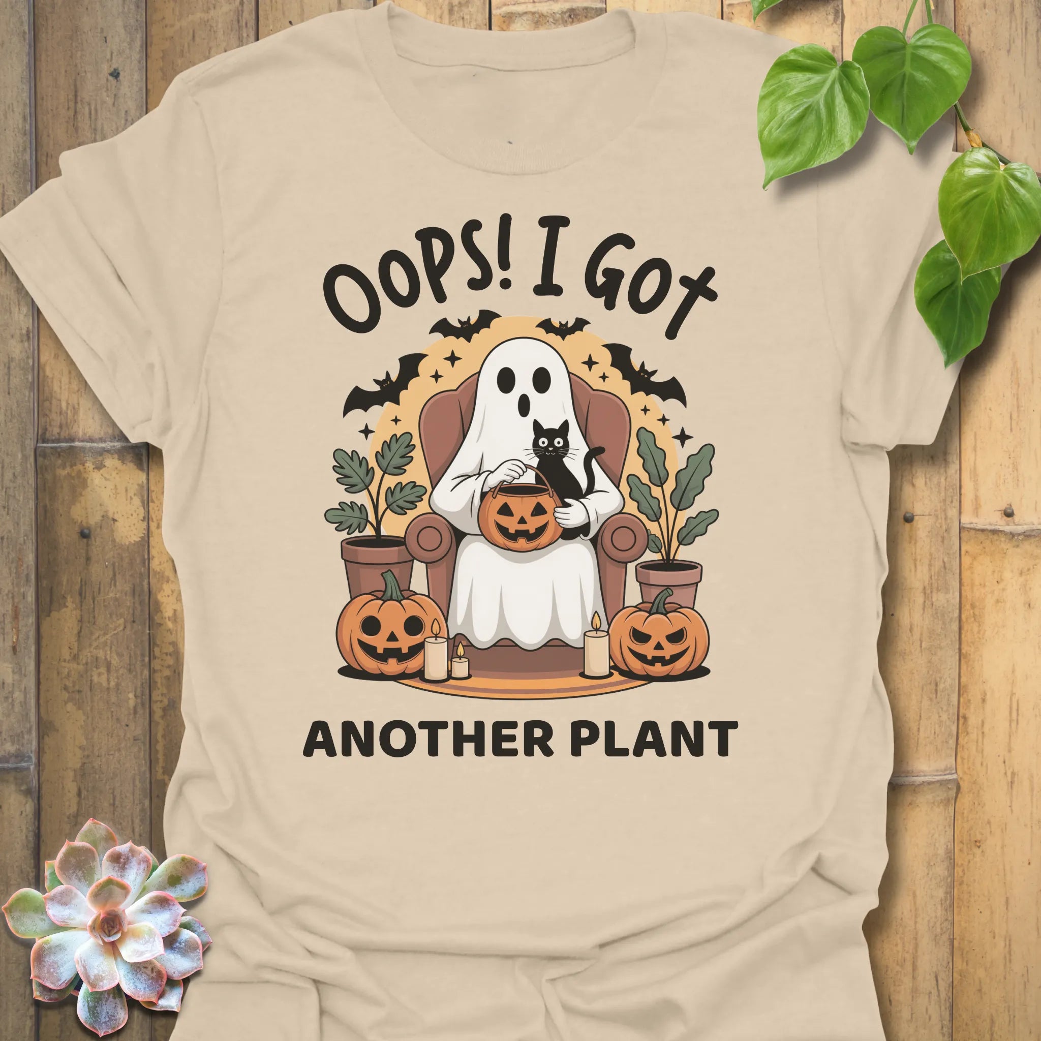Sand t-shirt featuring the design Got Another Plant printed in bold black letters, halloween gardening tee.