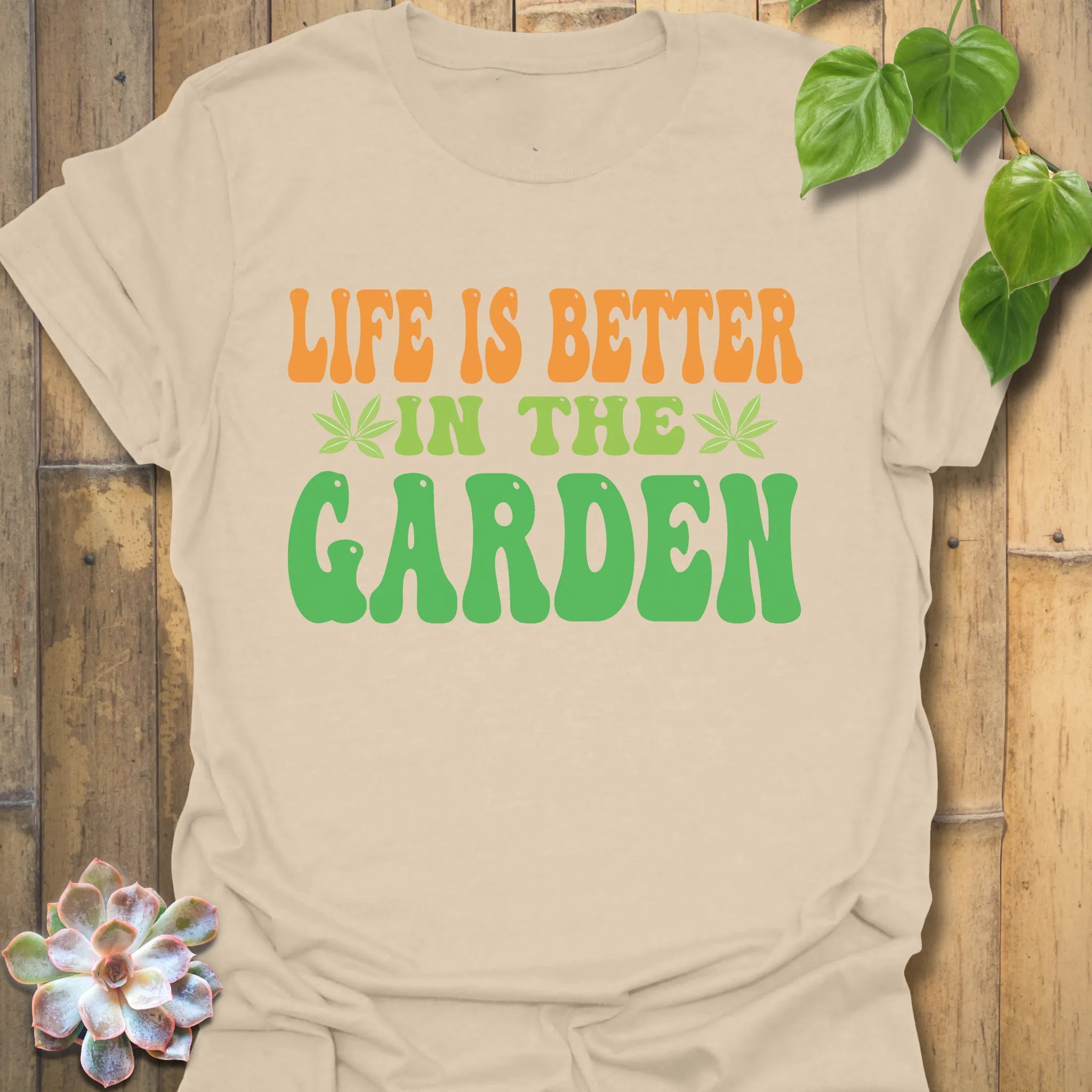 Sand t-shirt featuring the design Life Is Better printed in bold letters, positive vibes t-shirt.