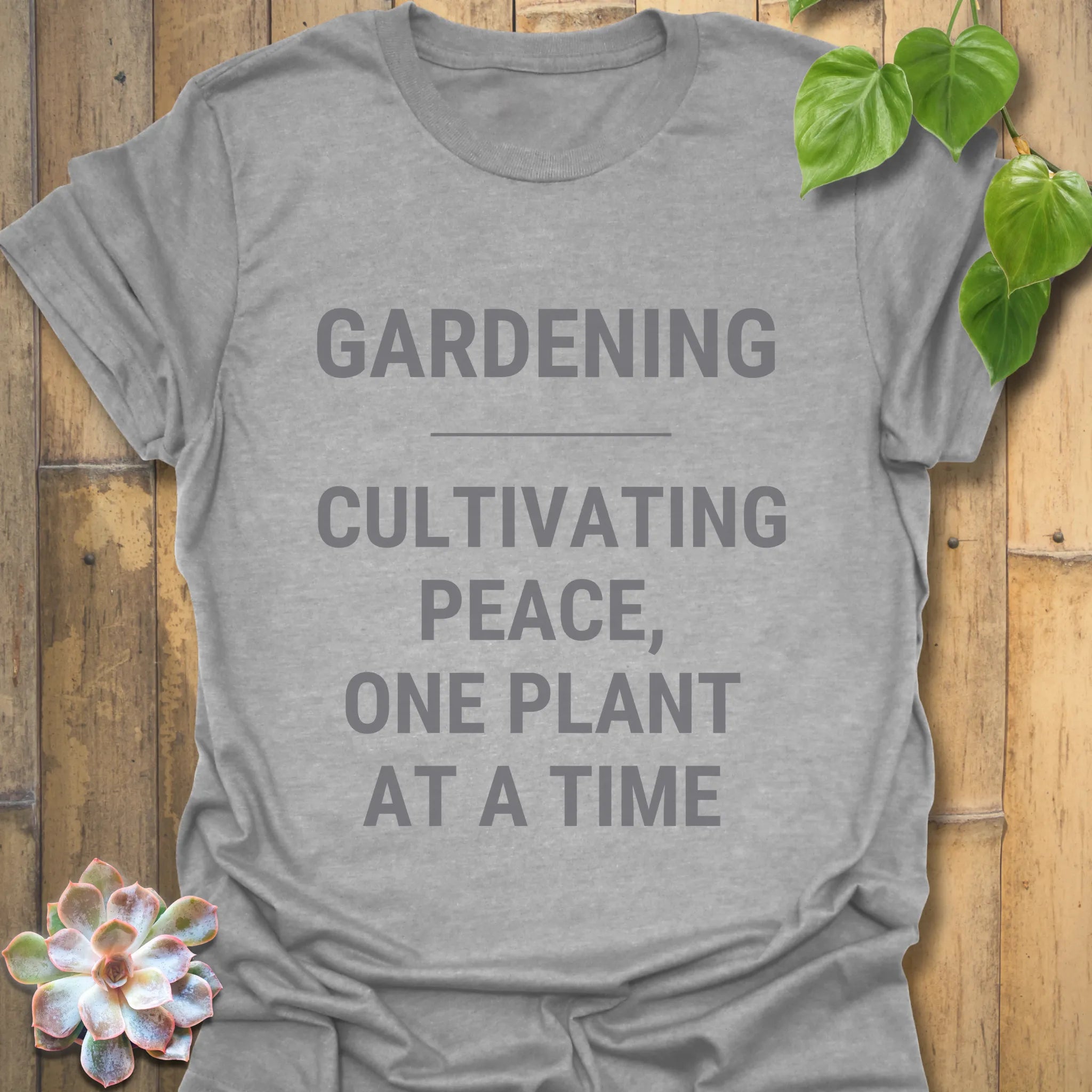Sport Grey t-shirt featuring the design Gardening Cultivating Peace One Plant at a Time, gardening slogan tee.