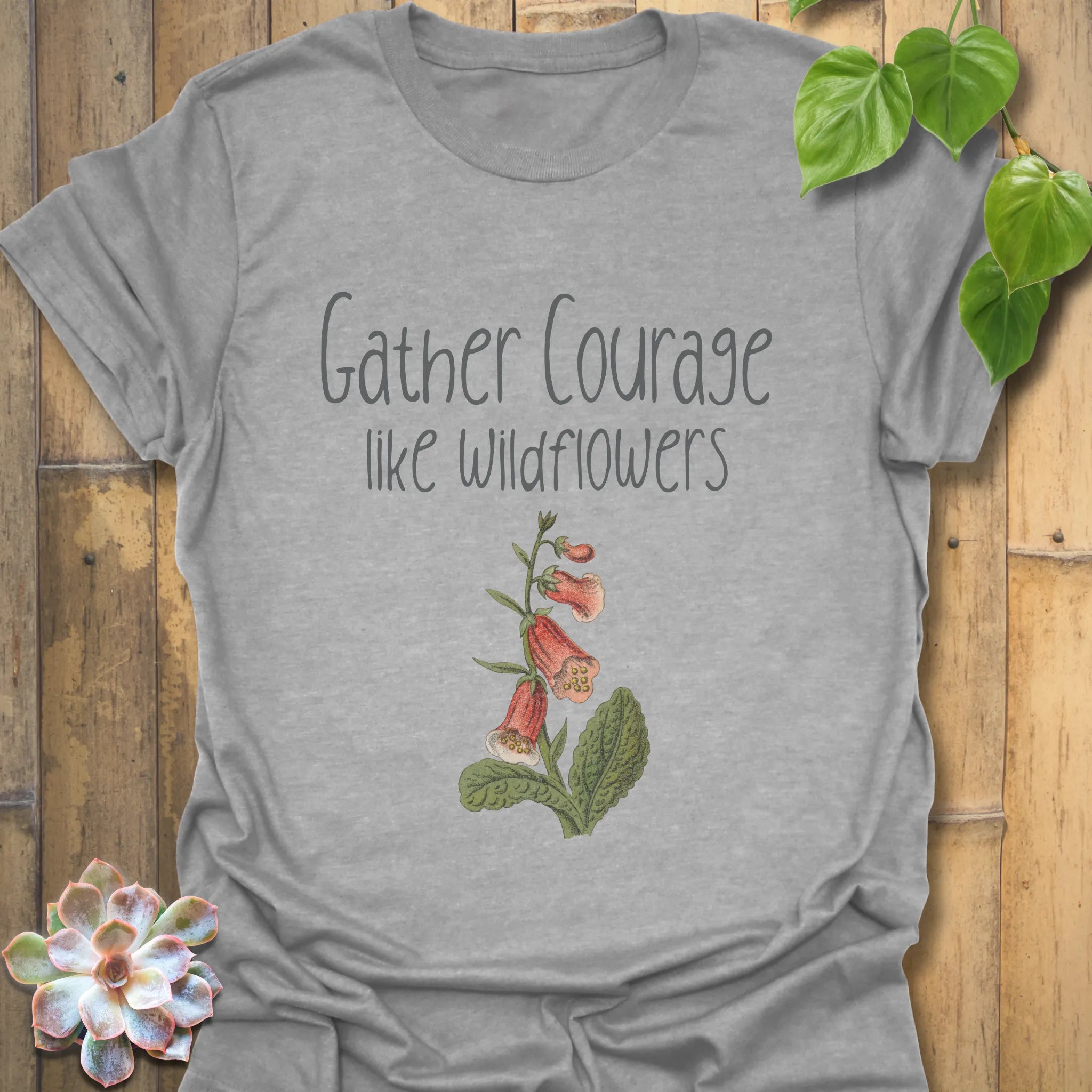 Sport grey floral inspirational t-shirt printed with the phrase ‘Gather courage like wildflowers’ and a flower graphic