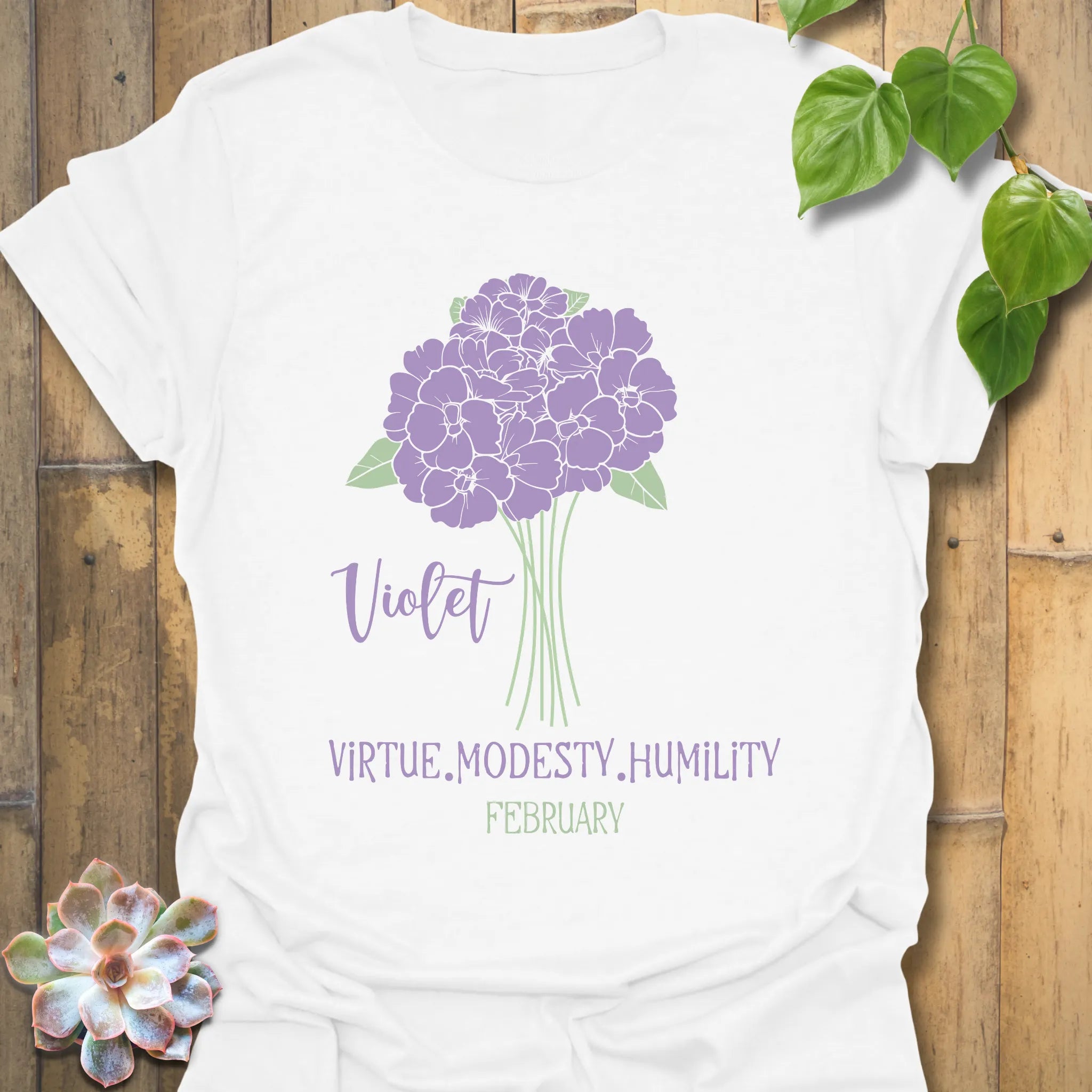 White t-shirt featuring the design February Violet with a rose flower print, perfect for a floral graphic tee lovers.