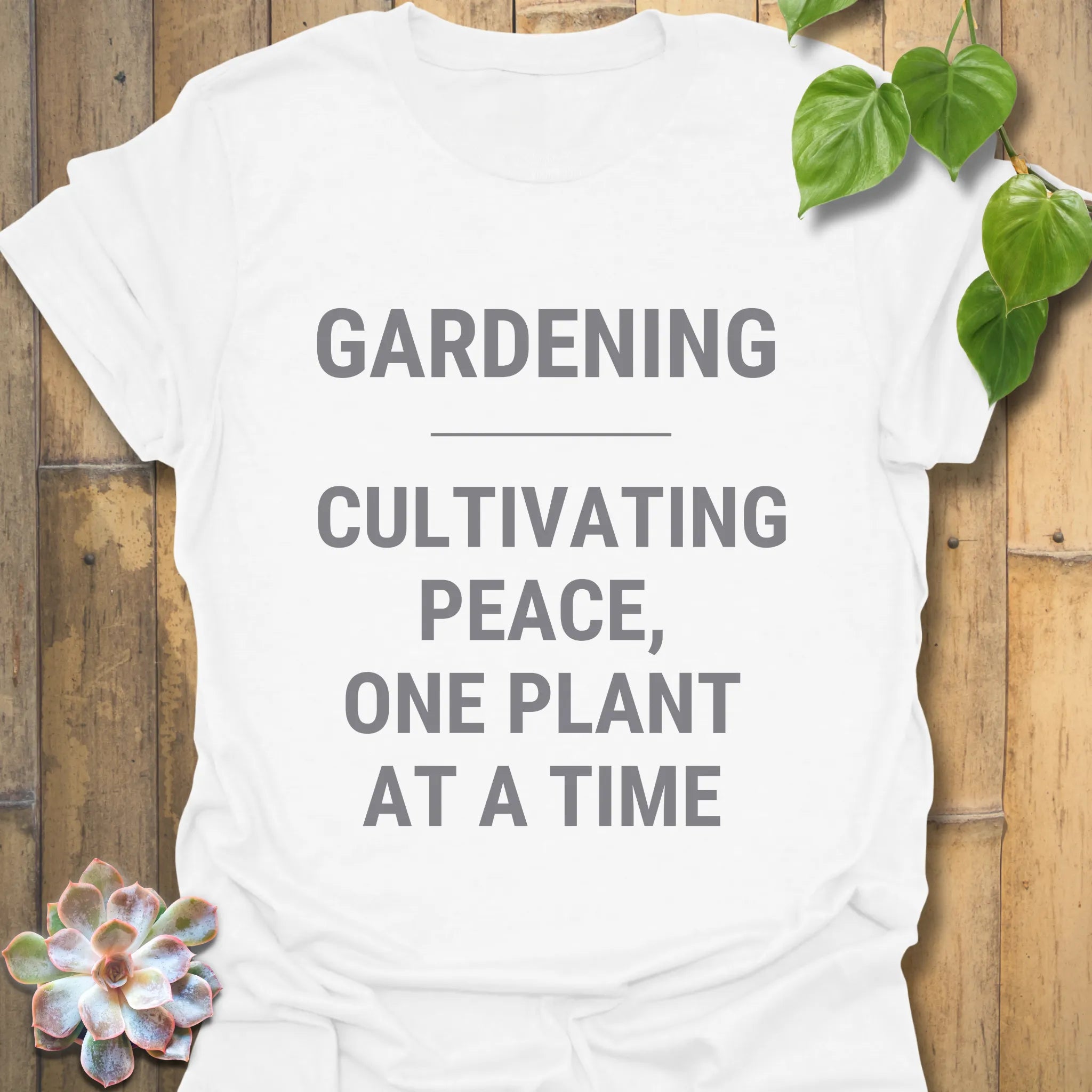 White t-shirt featuring the design Gardening Cultivating Peace One Plant at a Time printed, gardening graphic tee.