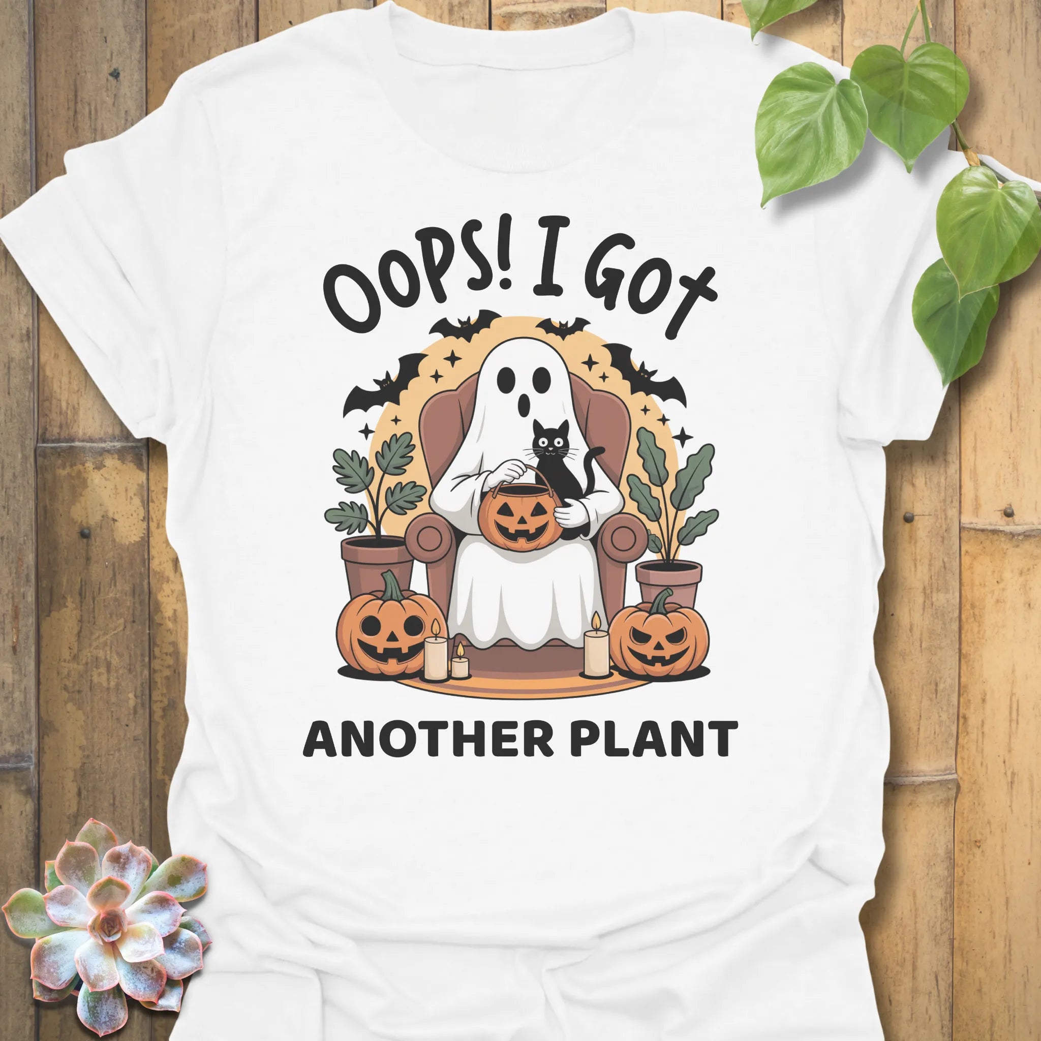 White t-shirt featuring the design Got Another Plant printed in bold black letters, halloween gardening tee.