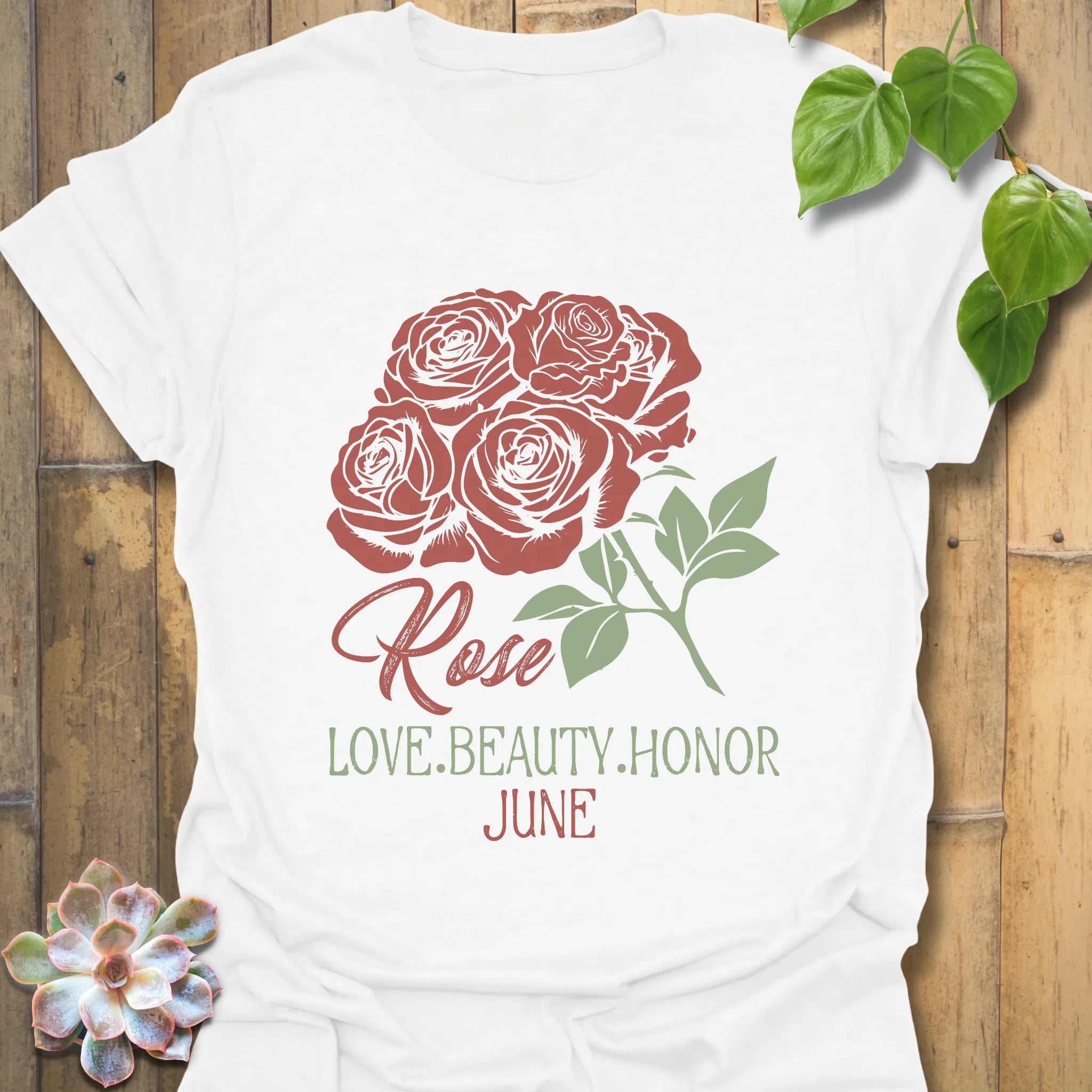 White t-shirt featuring the design June Rose with a detailed rose flower print, perfect as a casual floral graphic tee.