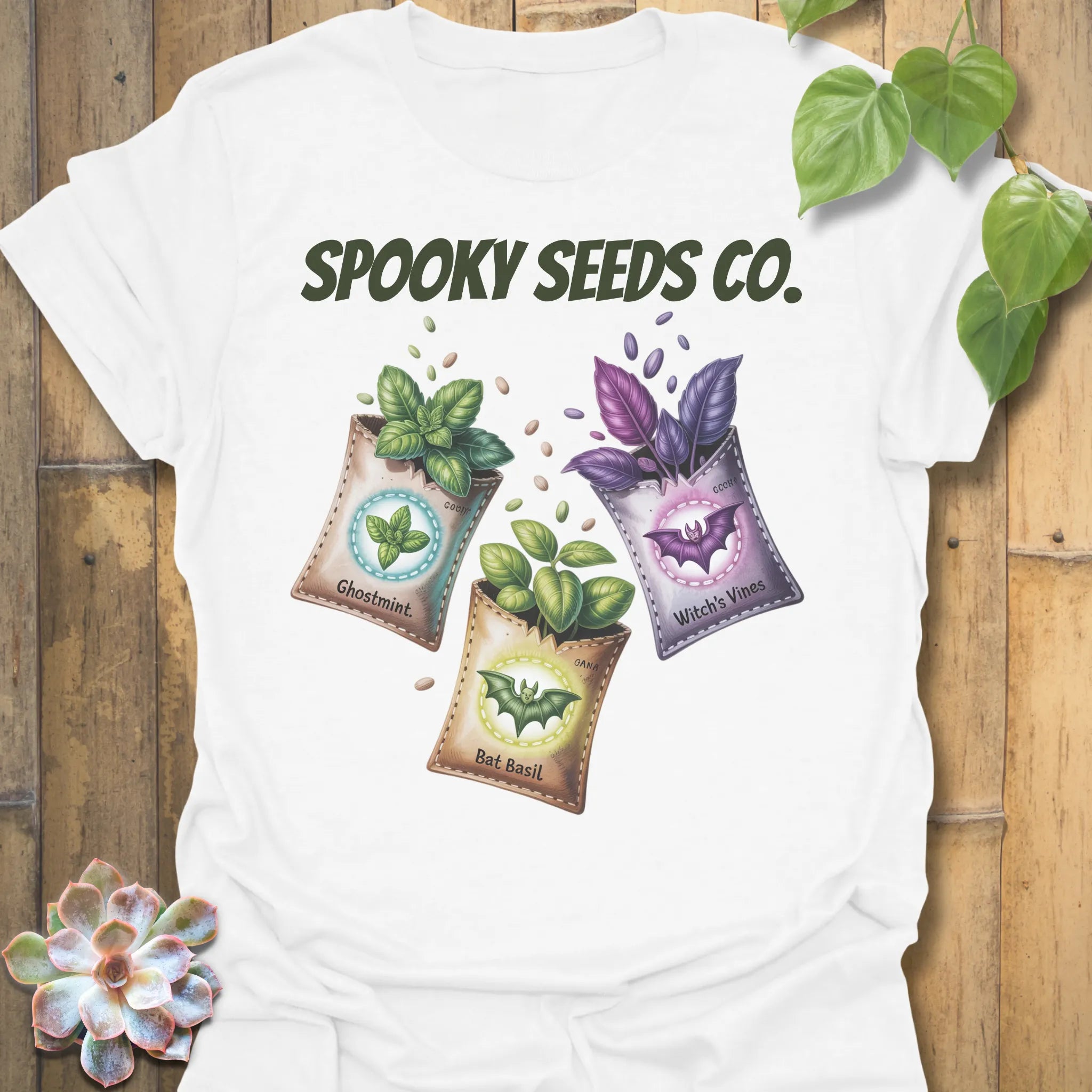 White t-shirt featuring the design Spooky Seeds Co. printed in bold letters, spooky plant lover shirt.