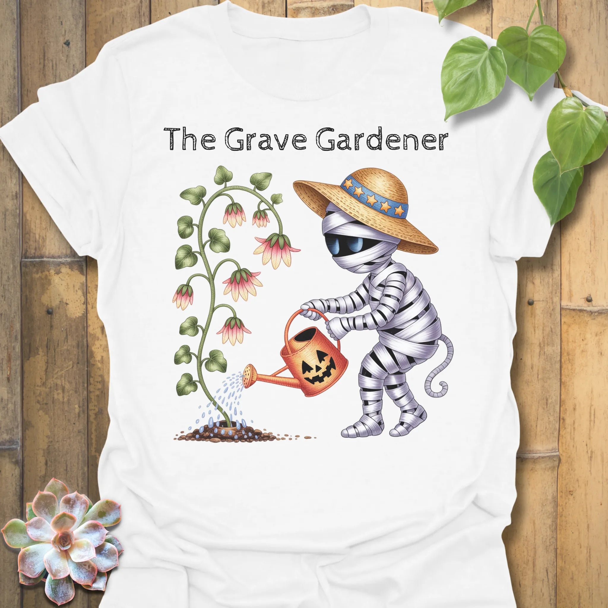 White t-shirt featuring the design The Grave Gardener printed in halloween plant shirt.