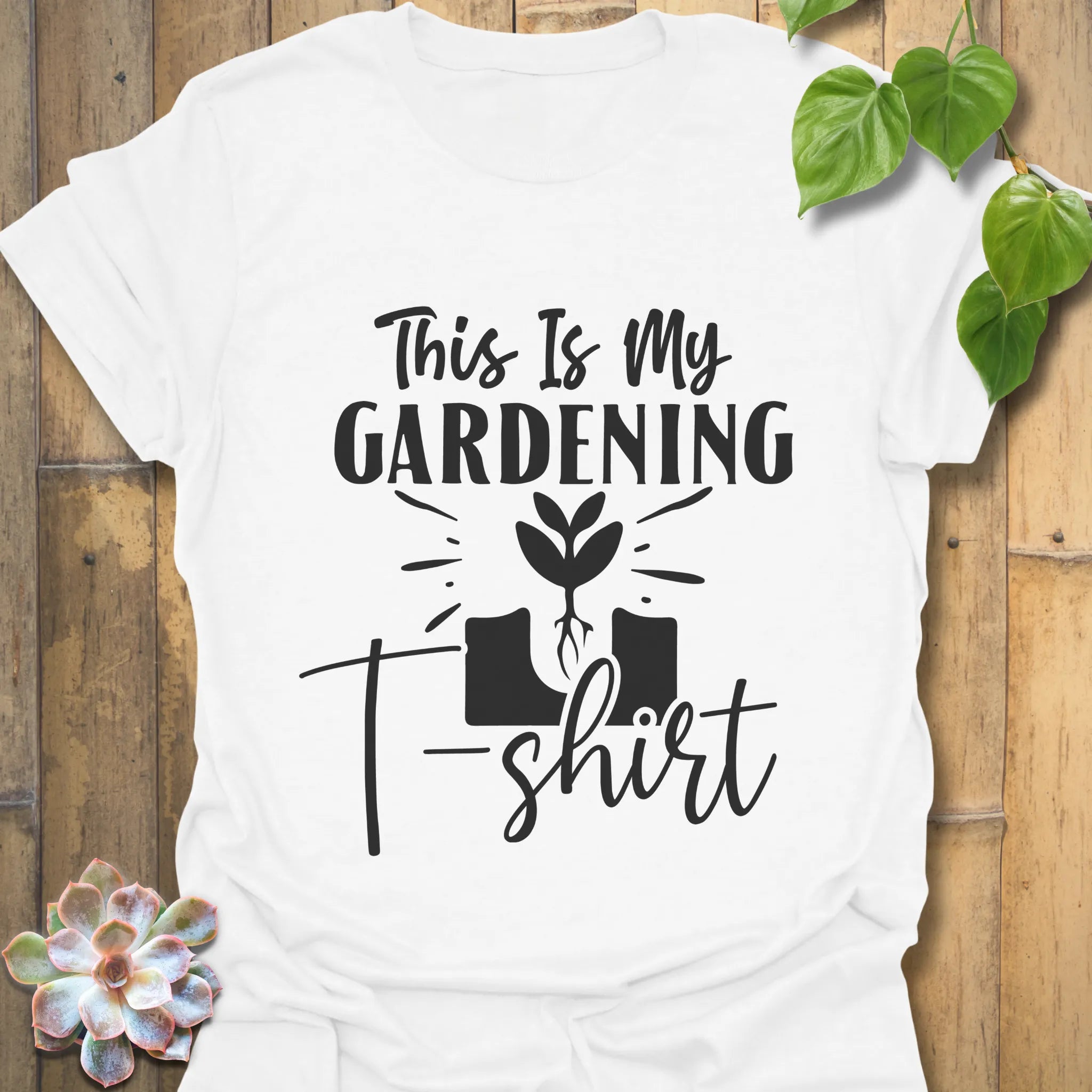 White t-shirt featuring the design This Is My Gardening T-shirt printed in bold lettering, perfect for garden lovers and plant enthusiasts.