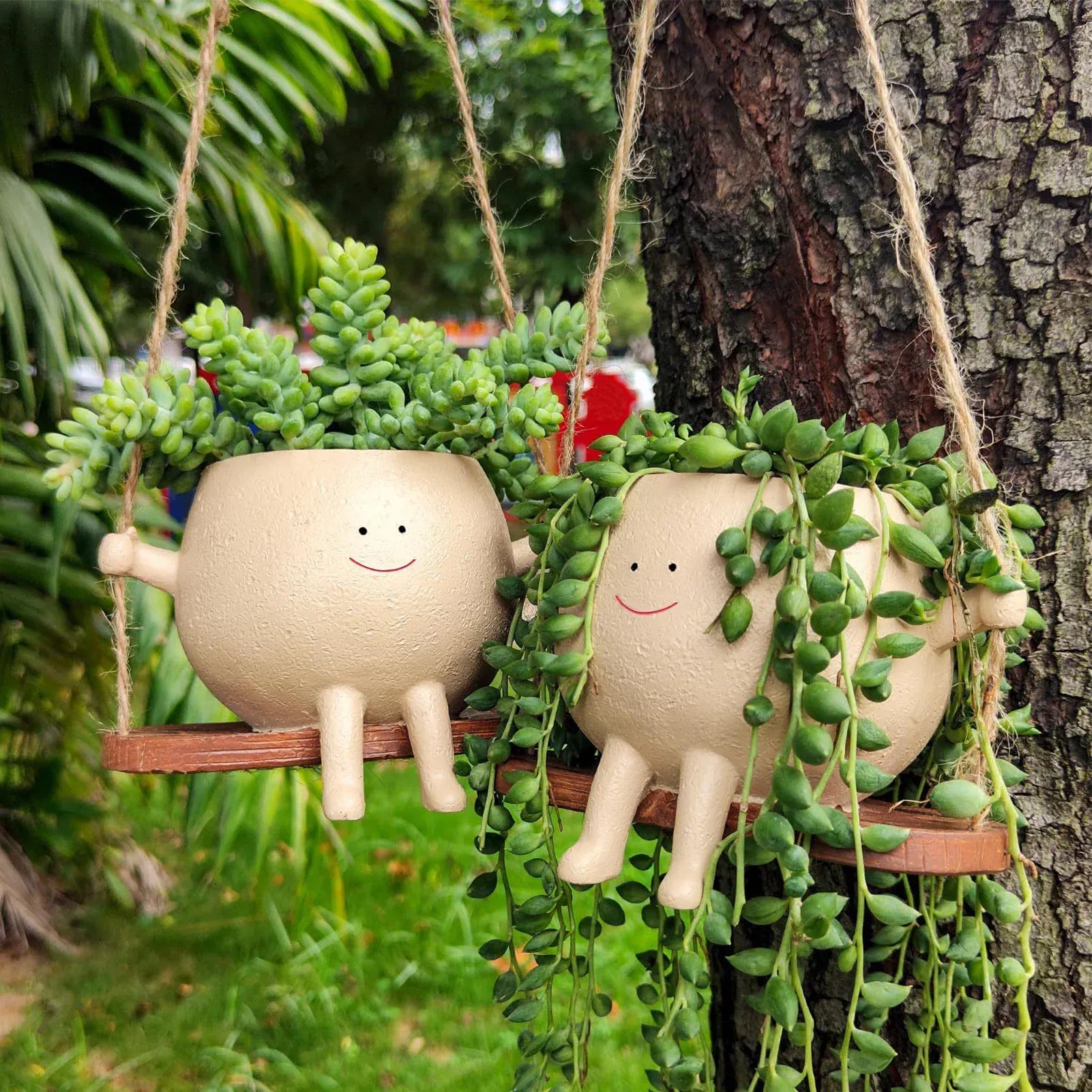 Charming Resin Face Planter with Swing