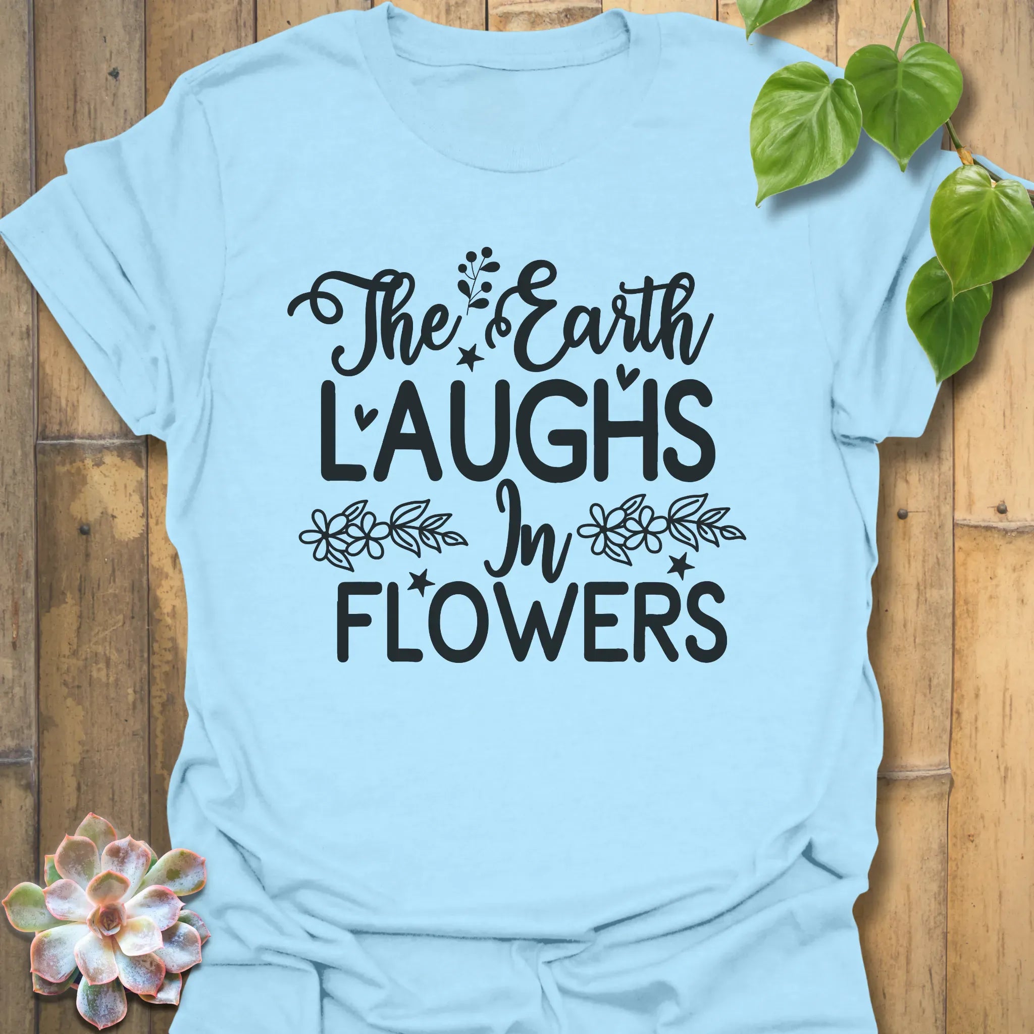 The Earth Laughs T-shirt Light Blue / S T-Shirt