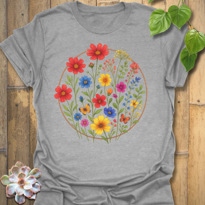 Sport grey “Circle of Flowers” graphic tee featuring a bright wildflower circle design — soft and breathable Gildan 64000 cotton blend.