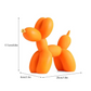 orange balloon art dog