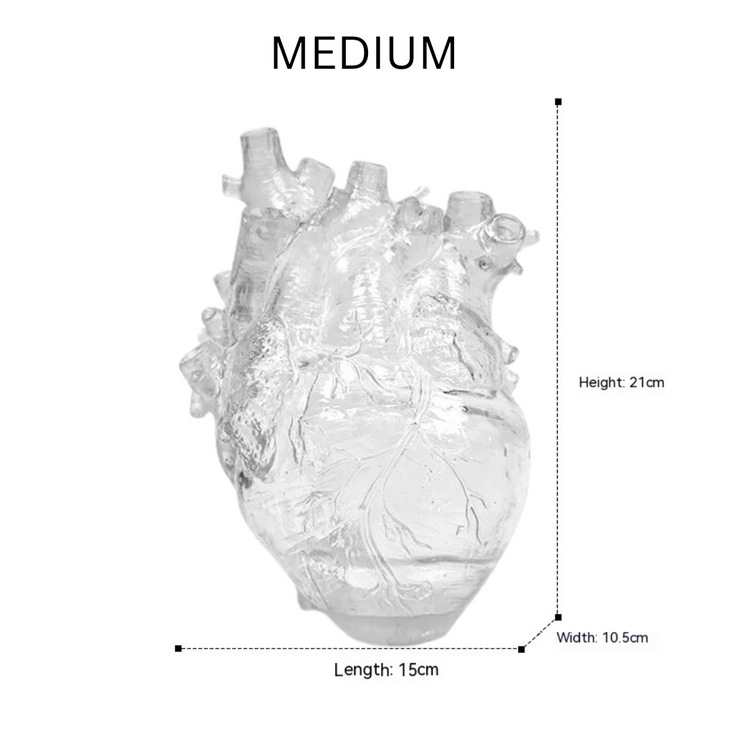 small clear heart shaped vase