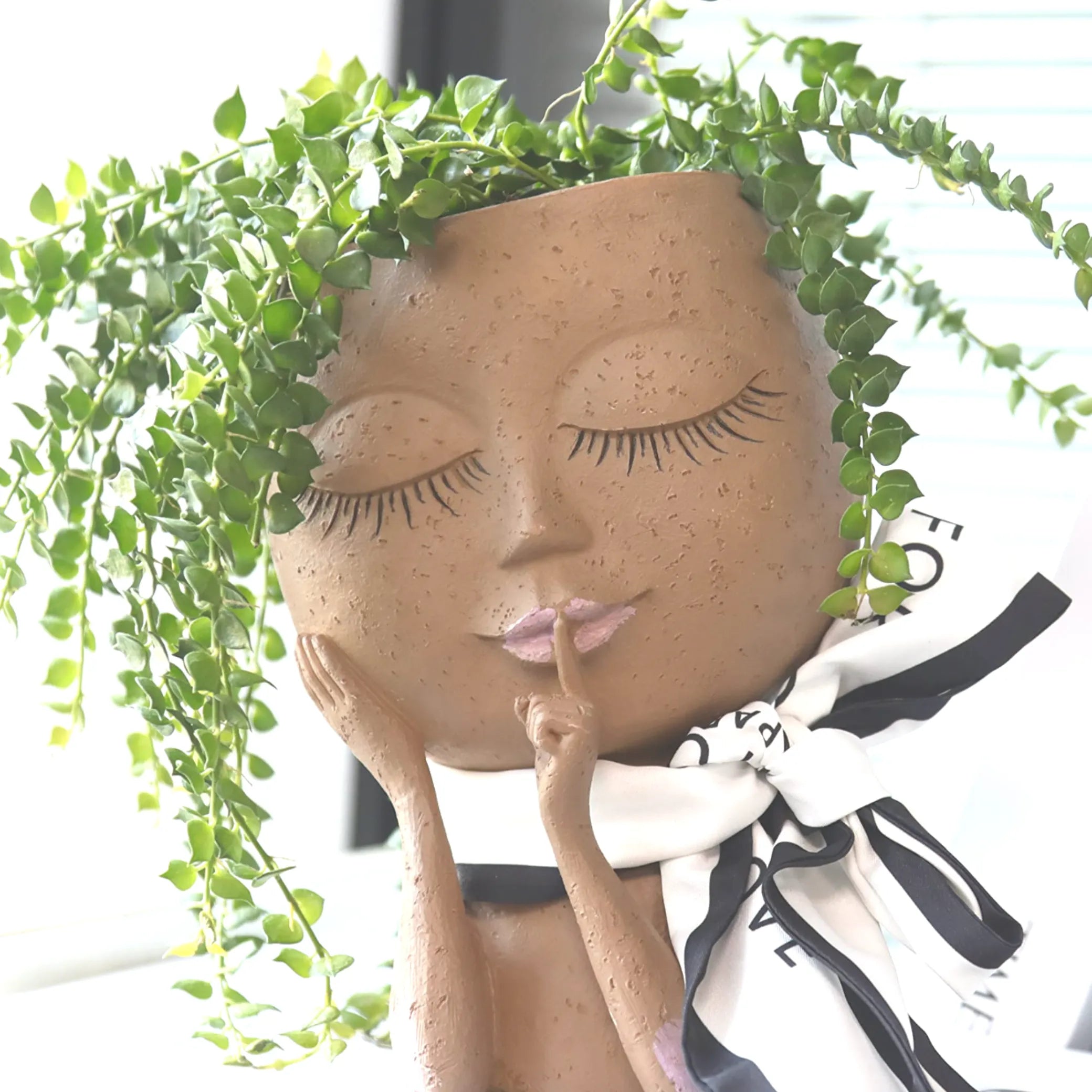 Head shaped flower pot