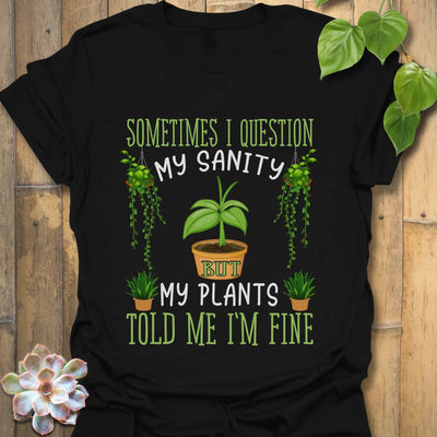Black t-shirt with the phrase “Sometimes I question my sanity but my plants told me I&