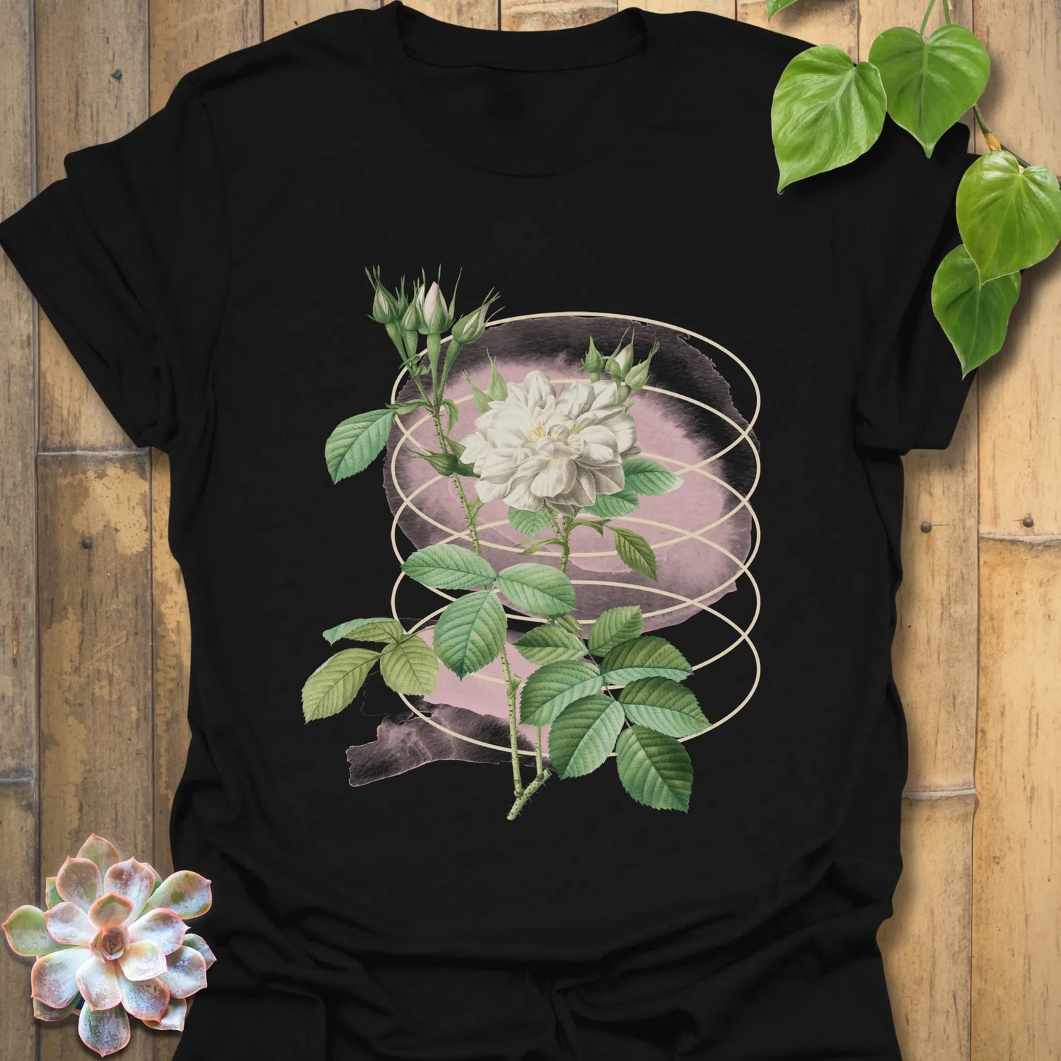Black t-shirt featuring the Blossom Whisper design with a detailed flower illustration on the front