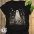 Black t-shirt featuring the design Among The Wildflowers printed in halloween floral graphic tee.