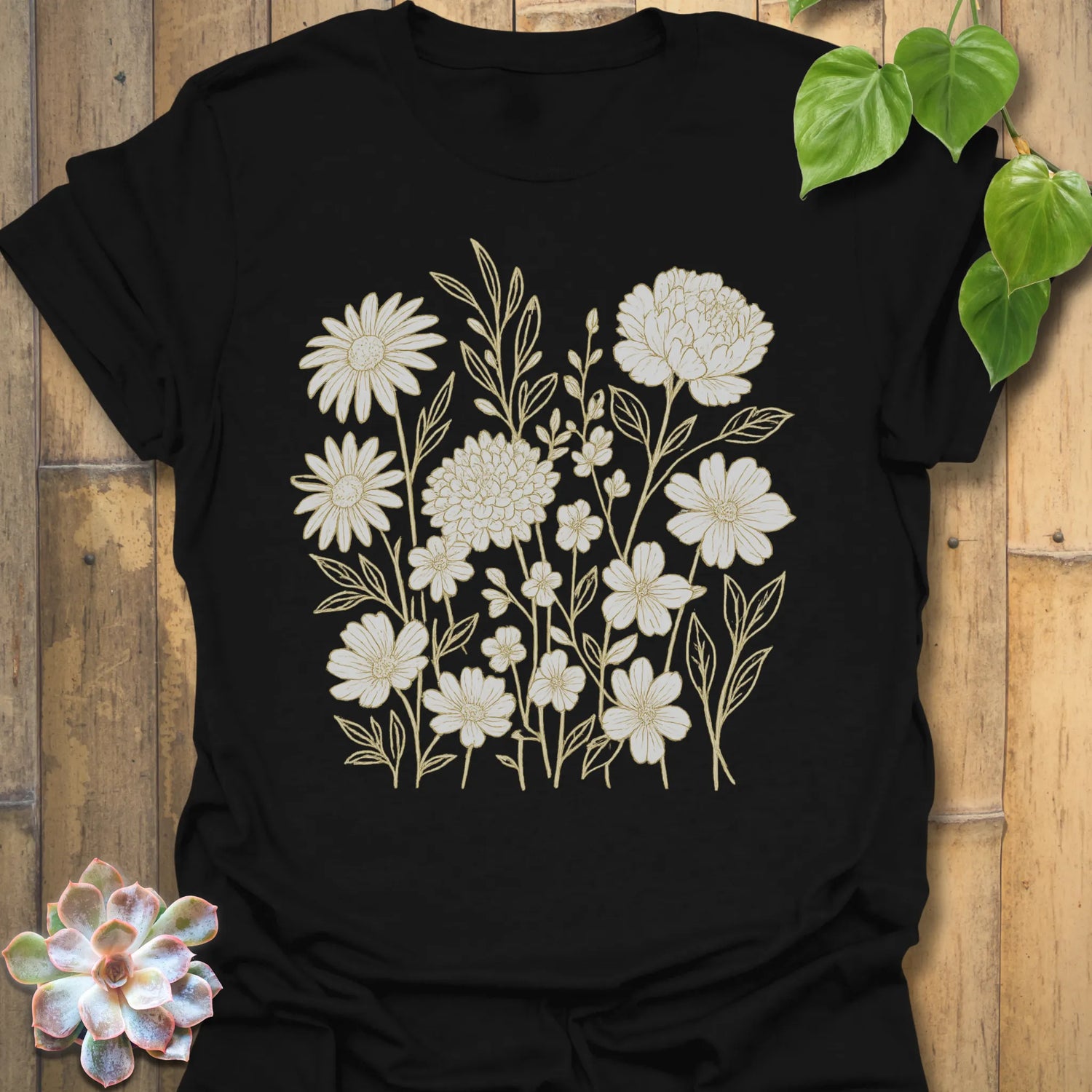 Black t-shirt featuring the design Eternal Flowers printed in floral graphic, flower lover t-shirt.