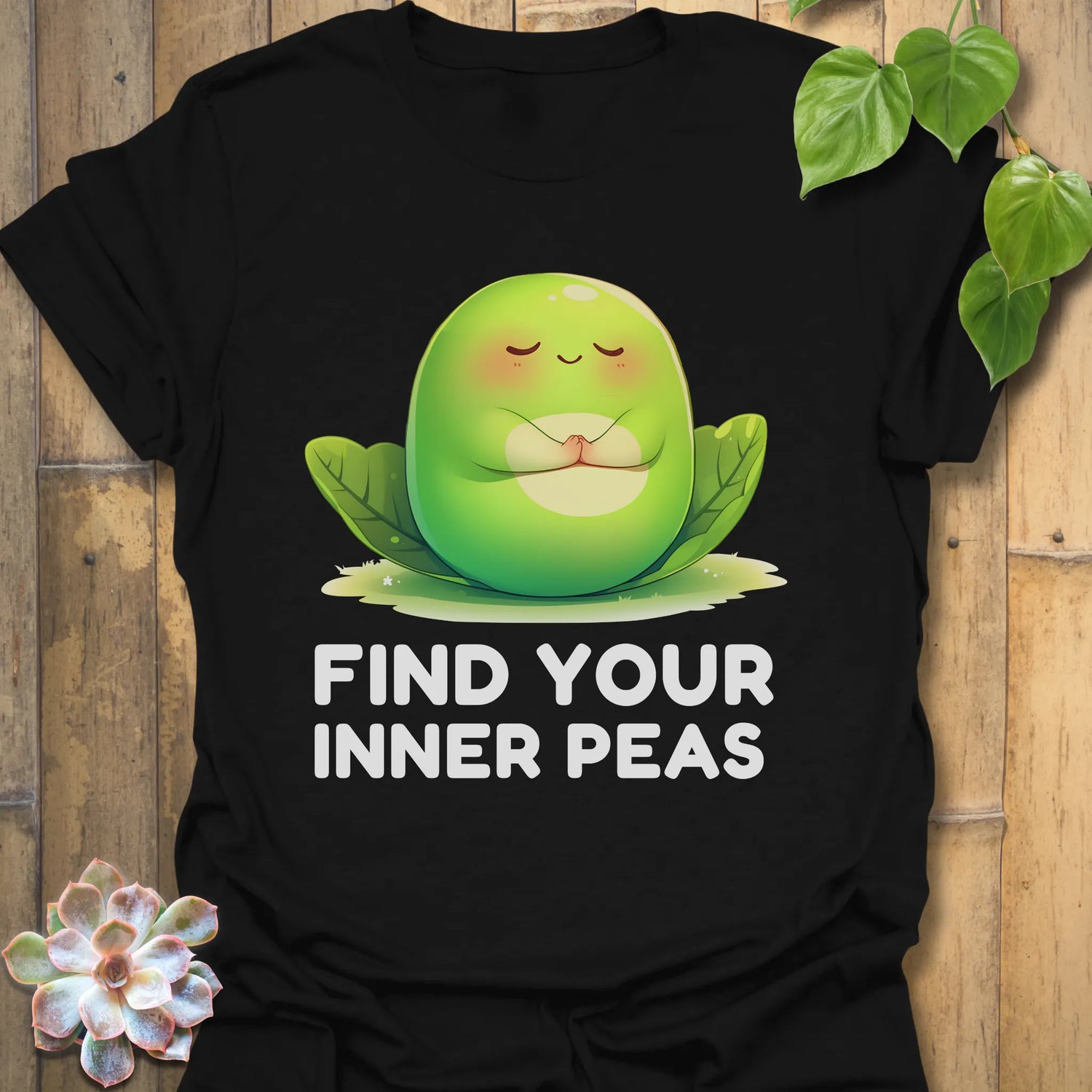 Black t-shirt featuring the design Find Your Inner Peas printed in bold green letters with playful pea graphics
