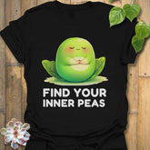 Black t-shirt featuring the design Find Your Inner Peas printed in bold green letters with playful pea graphics