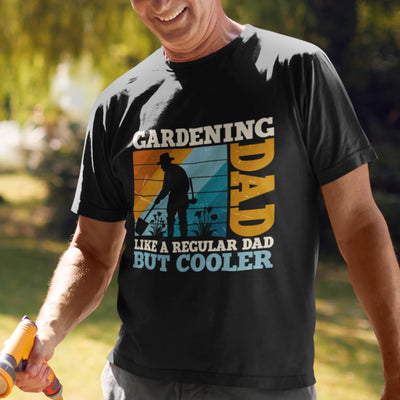 Black t-shirt featuring the design Gardening Dad, Like a Regular Dad But Cooler, a humorous dad gardening shirt with a cool vibe.