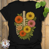 Black t-shirt featuring the design Gerbera Bones printed in floral skeleton graphic tee.