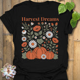 Black t-shirt featuring the design Harvest Dreams printed in bold orange letters, cosy harvest tee.