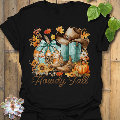 Black t-shirt featuring the design Howdy Fall printed in brown letters, cute fall aesthetic shirt.
