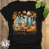 Black t-shirt featuring the design Howdy Fall printed in brown letters, cute fall aesthetic shirt.