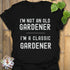 Black t-shirt featuring the design “I’m not an older gardener, I’m a classic gardener” funny gardening shirt.