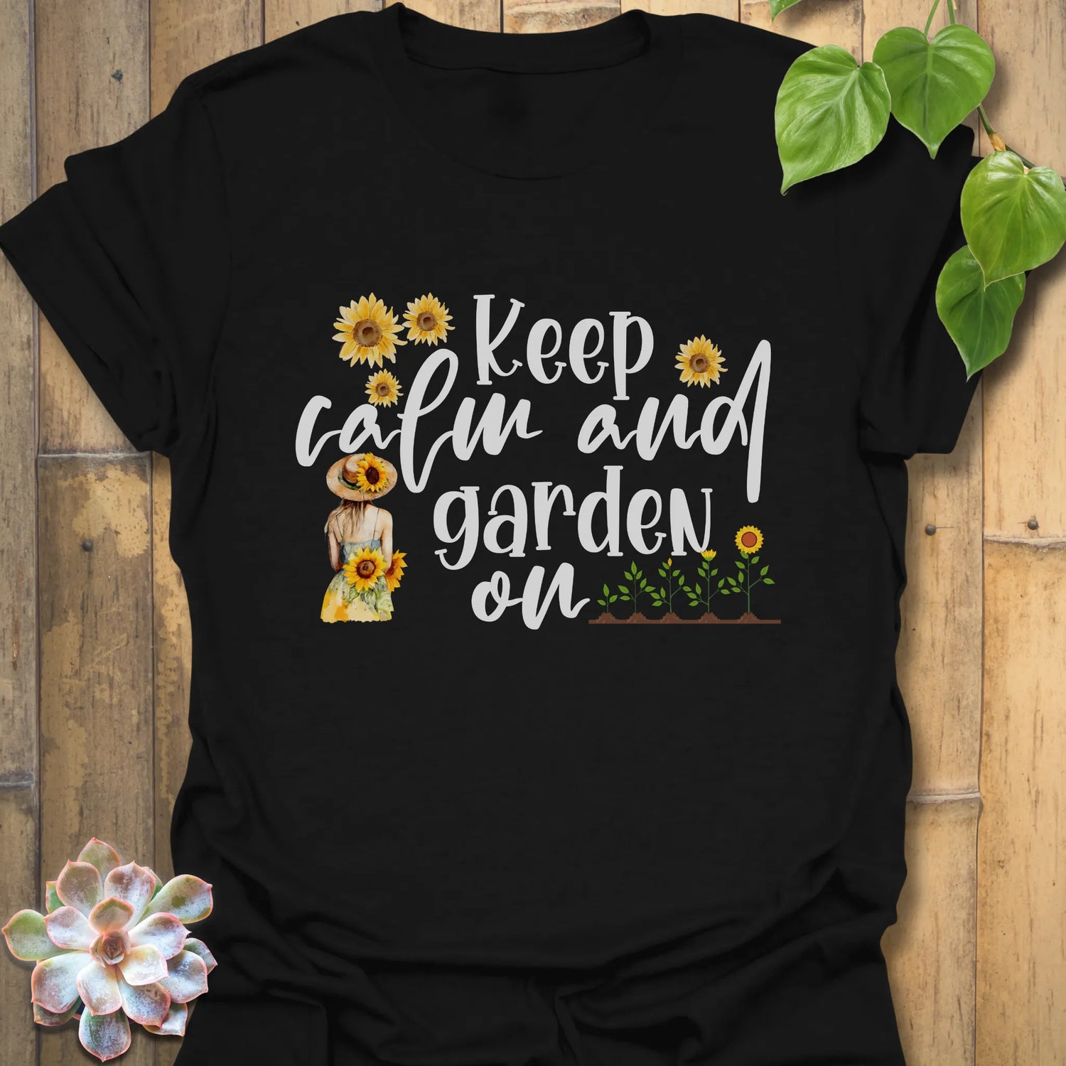 Black t-shirt featuring the design Keep Calm and Garden On, funny gardening tee.