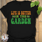 Black t-shirt featuring the design Life Is Better printed in bold letters, positive vibes t-shirt.
