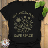 Black t-shirt featuring the design My Safe Place printed in bold letters, warm tone mindfulness shirt.