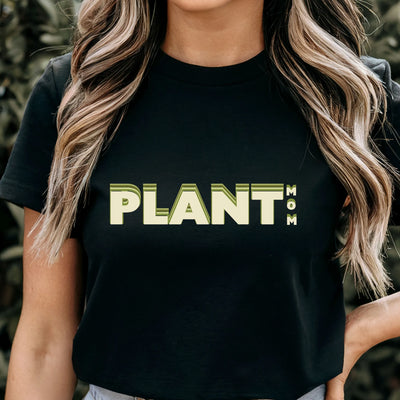 Black t-shirt featuring the design Plant Mum, stylish plant lover gift shirt.