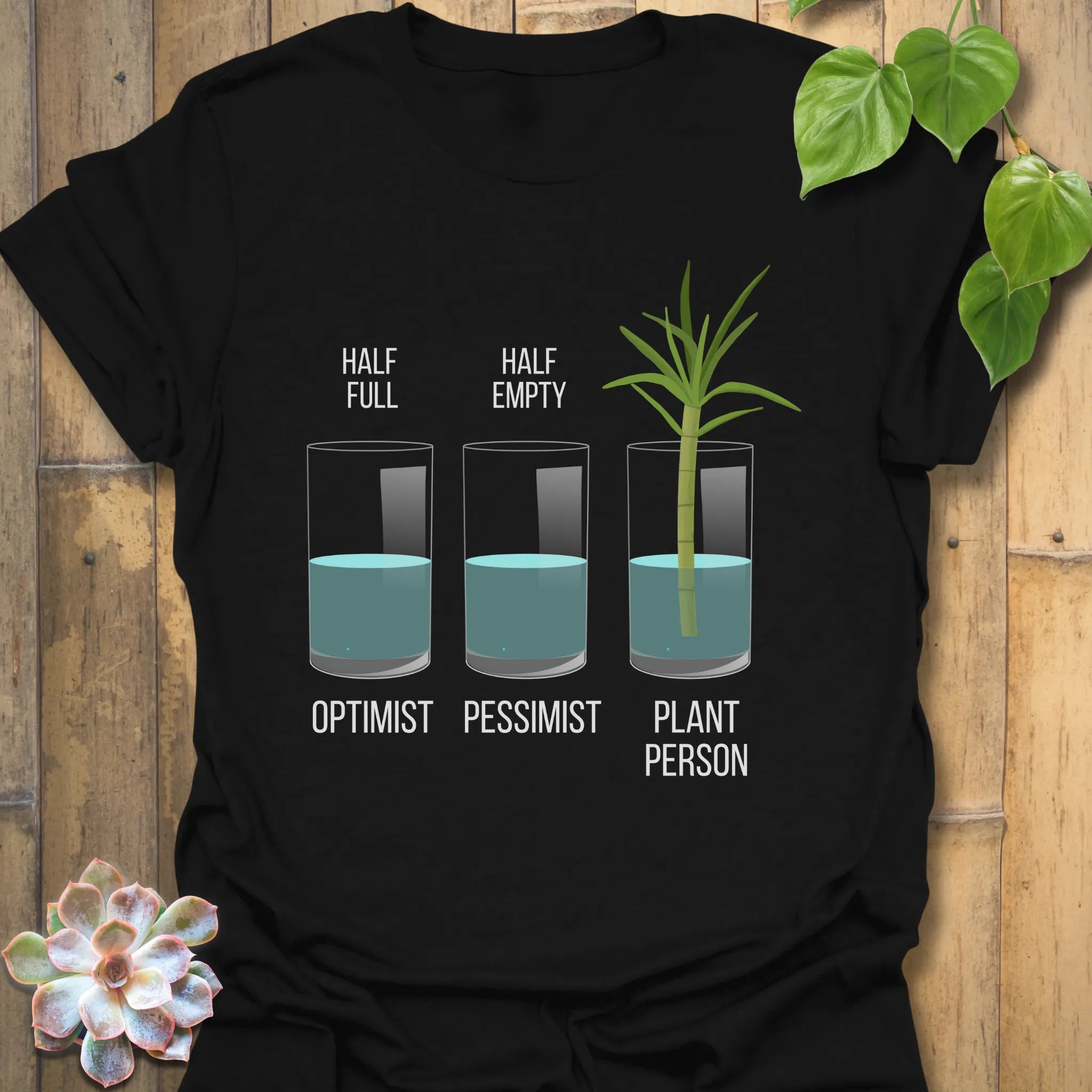 Black t-shirt featuring the design Plant Person printed, minimalist plant graphic tee.