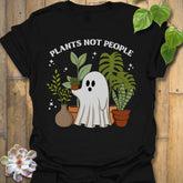 Black t-shirt featuring the design Plants Not People printed in bold white letters, halloween plant lover graphic tee.