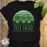 Black t-shirt featuring the design Pot Head printed in bold green letters, garden lover shirt.