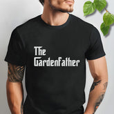 Black t-shirt featuring the design The Gardenfather printed in bold white letters, garden lover t-shirt.