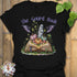 Black t-shirt featuring the design The Gourd Book printed in halloween pumpkin shirt.