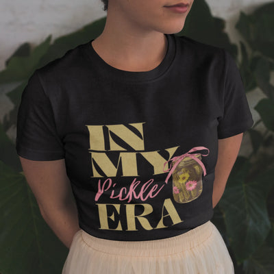 Black t-shirt featuring the funny design “In My Pickle ERA” with cucumbers drawn inside a glass jar