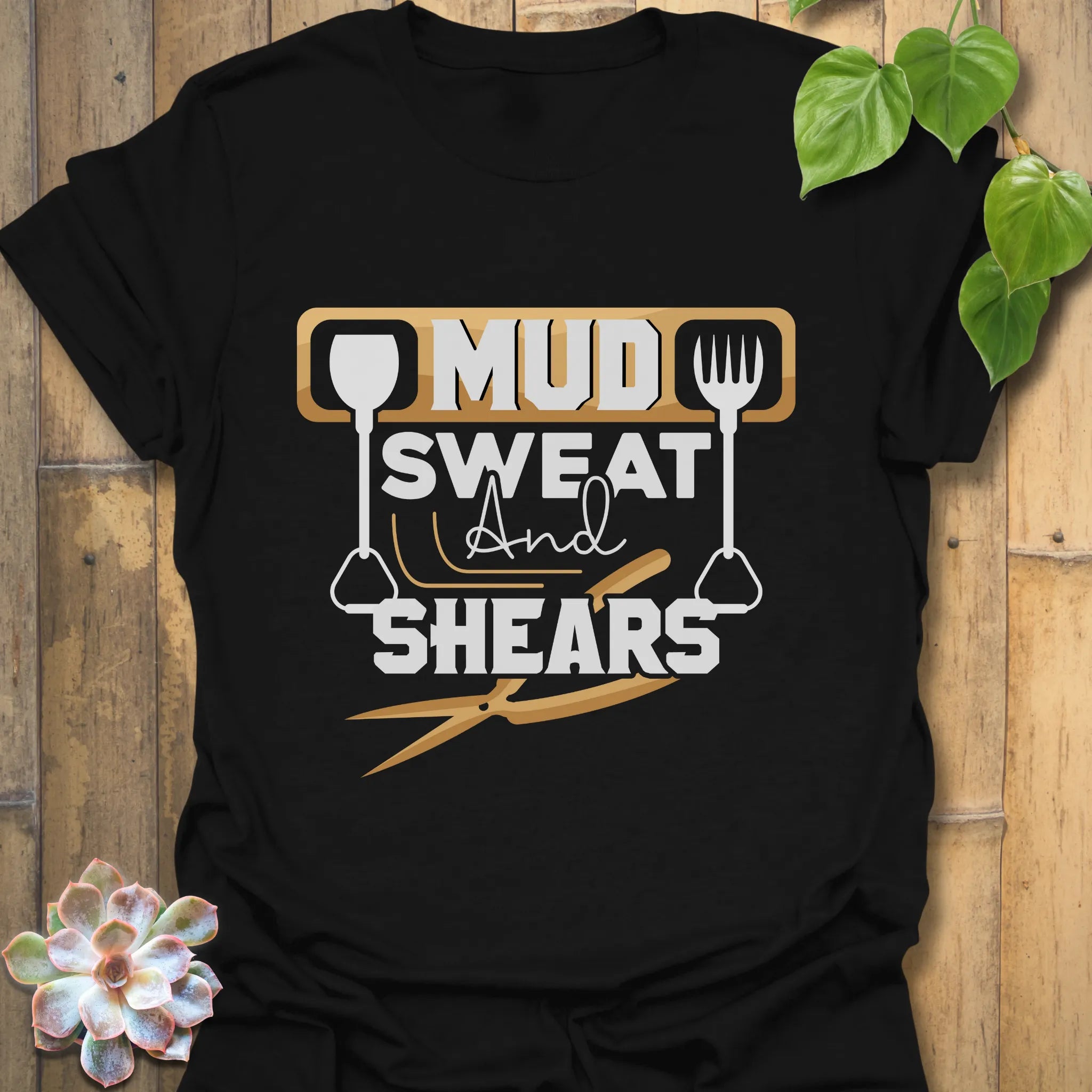 Black unisex t-shirt featuring the design Mud Sweat And Shears, modern gardening tee for men and women.