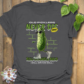 Charcoal grey t-shirt featuring the text “Old Pickles Never Die Dill-Iliously Bold” with a cucumber character in shades