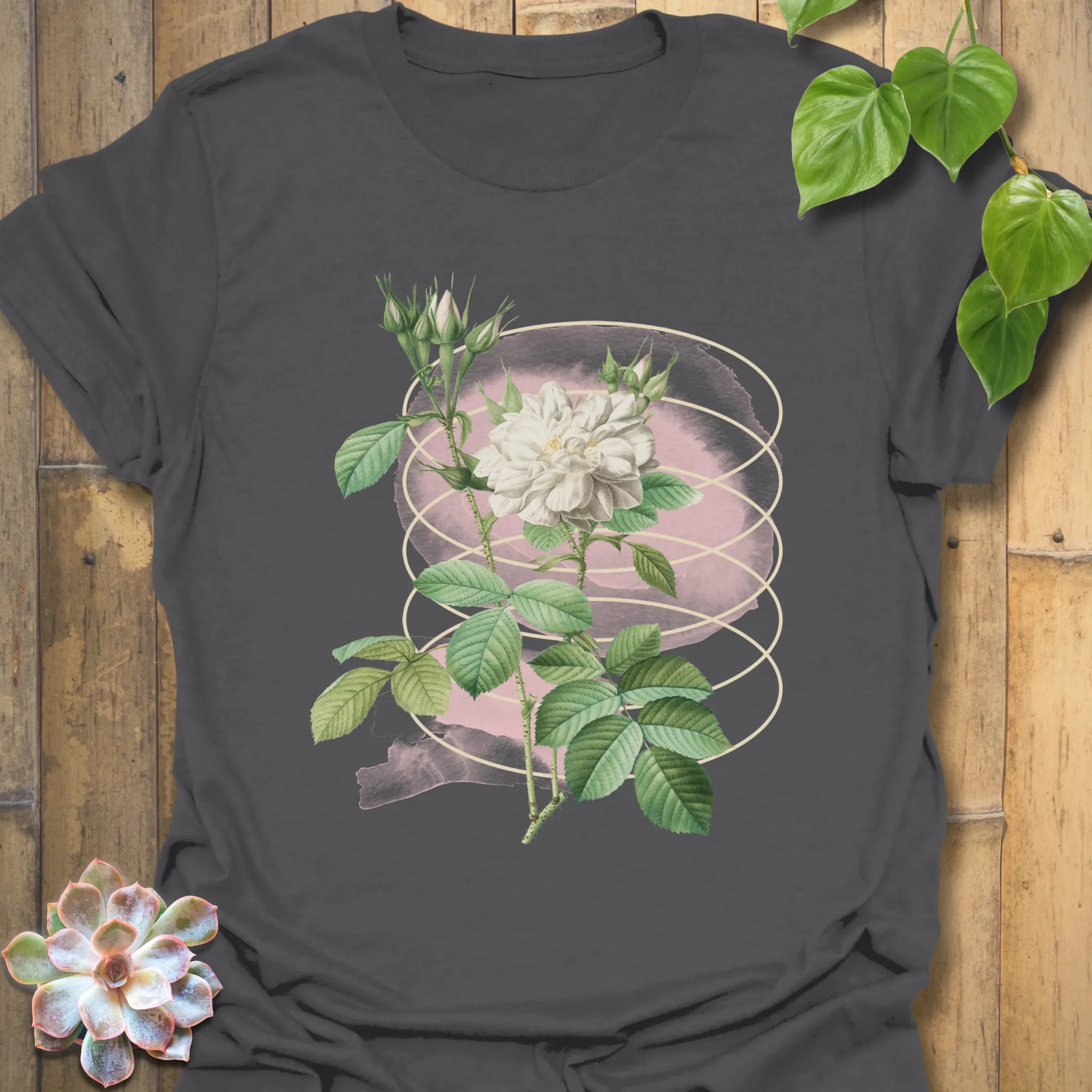 Charcoal grey t-shirt with the Blossom Whisper design showing a delicate flower print