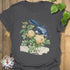 Charcoal t-shirt featuring the Botanical Flight design with a bird and flower print
