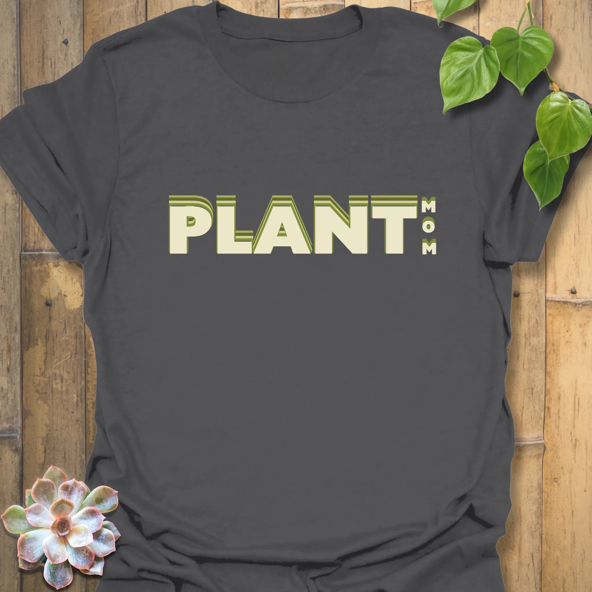Charcoal t-shirt featuring the design Plant Mum, modern botanical style tee.