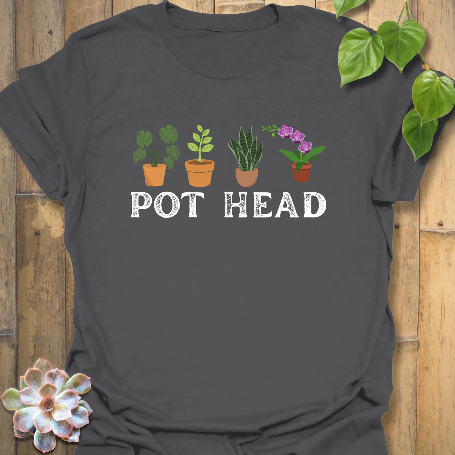 Charcoal t-shirt featuring the design Pot Head with flowers in a pot, modern floral humour shirt.
