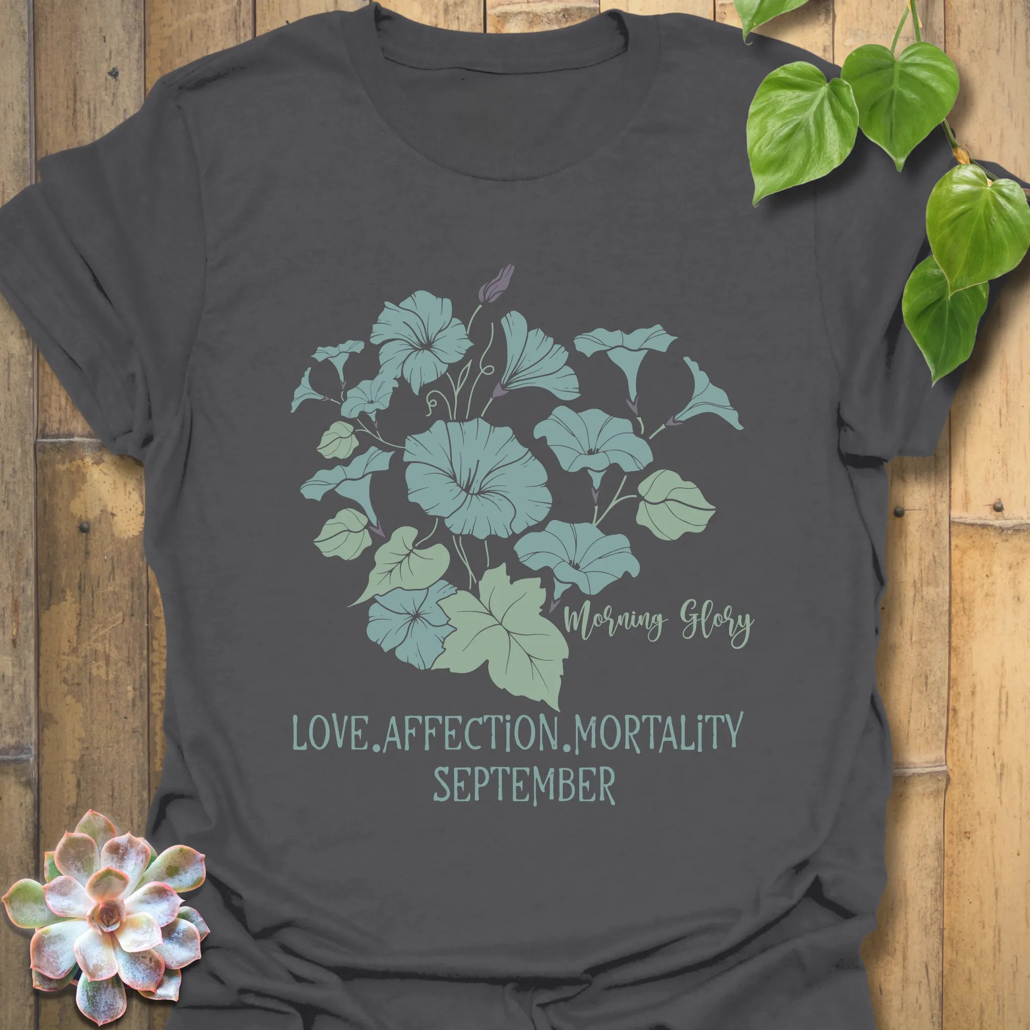 Charcoal t-shirt featuring the design September Morning Glory with a flower print, a modern dark floral graphic tee great for casual streetwear.