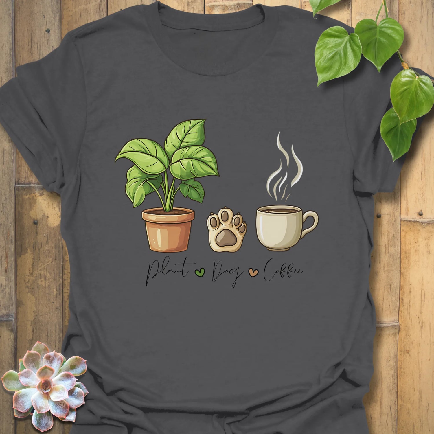 Charcoal t-shirt with “Plant, Dog, Coffee” lettering – modern unisex shirt for coffee lovers, dog lovers, plant fans.