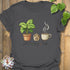 Charcoal t-shirt with “Plant, Dog, Coffee” lettering – modern unisex shirt for coffee lovers, dog lovers, plant fans.