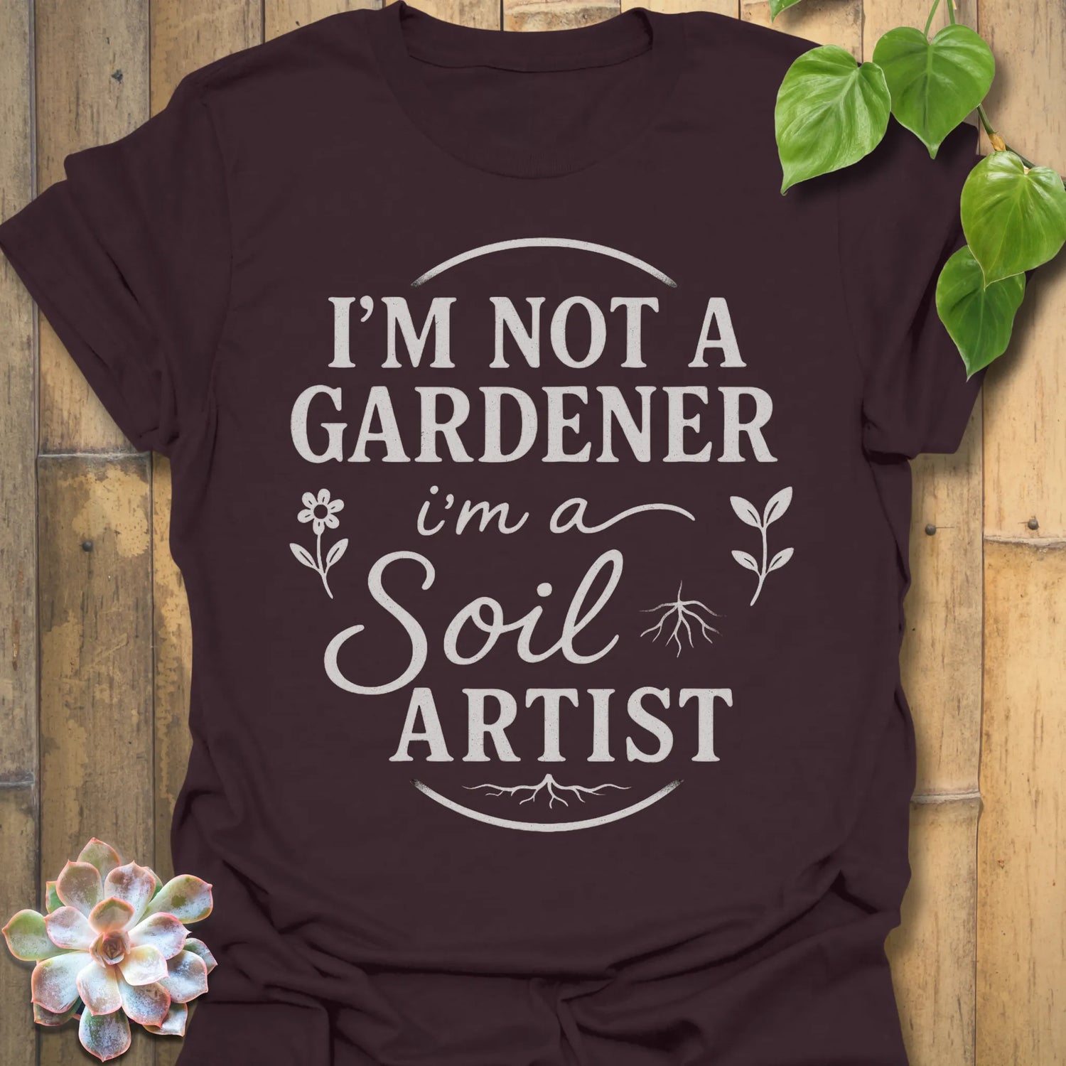 Chocolate Brown t-shirt featuring the design Soil Artist printed in bold letters, funny garden shirt.
