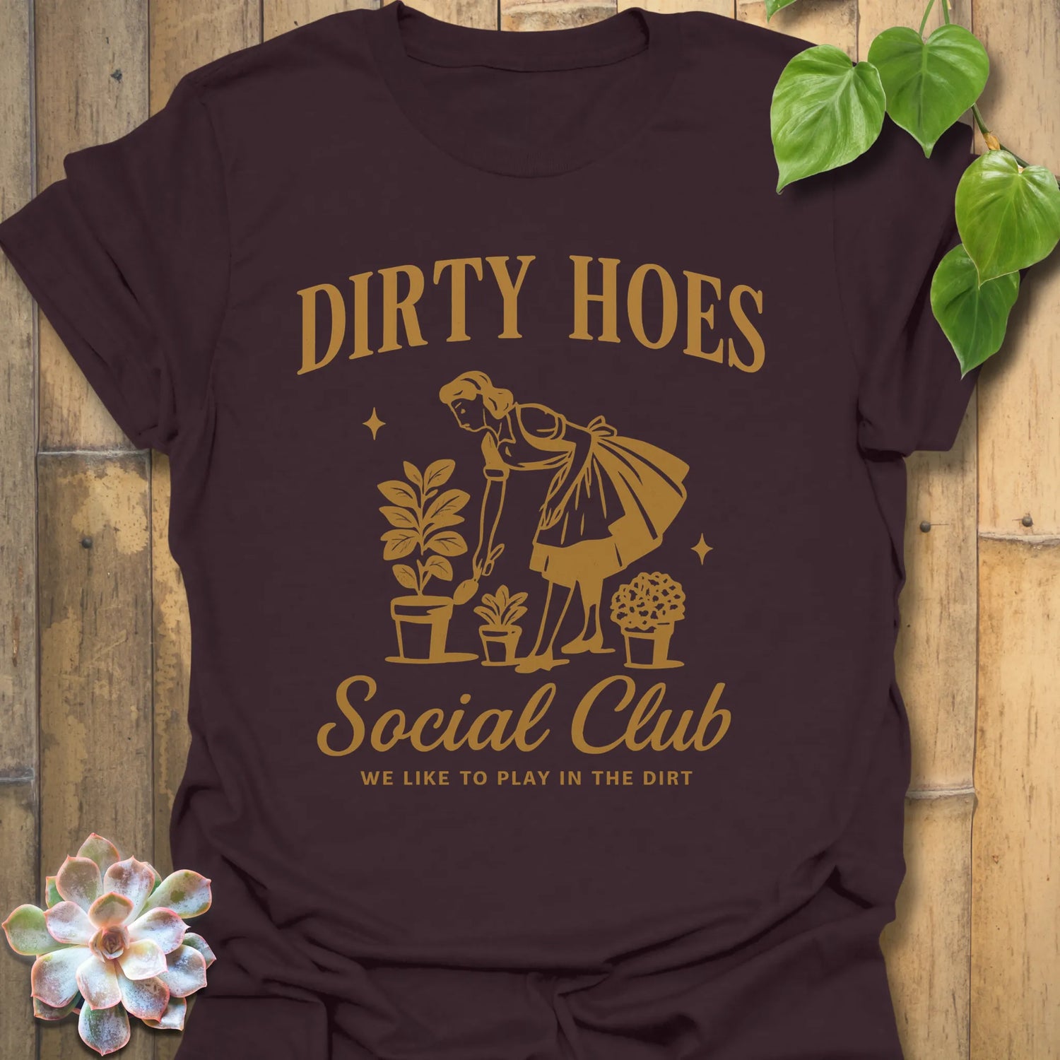 Dark Chocolate t-shirt featuring the design Dirty Hoes printed in bold letters, gardening graphic tee.